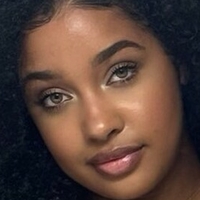 Corie Rayvon Nue